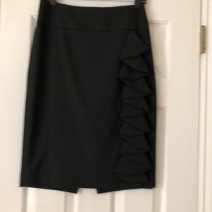 Express black pencil skirt with cascading drape and leopard lining